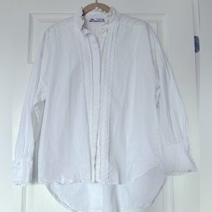 White ruffle shirt